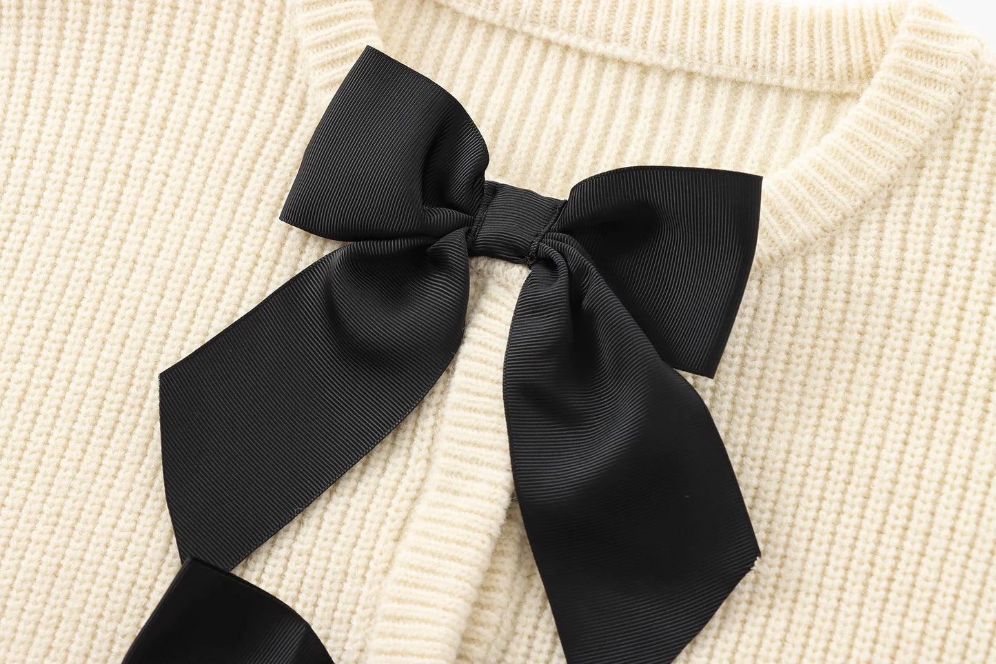 GIGI BOW CARDIGAN