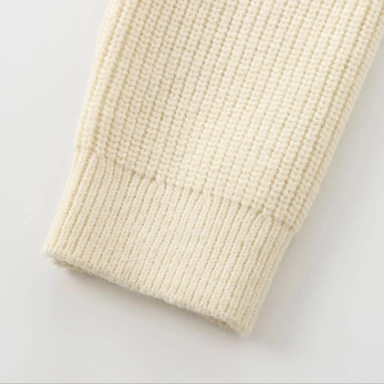 GIGI BOW CARDIGAN