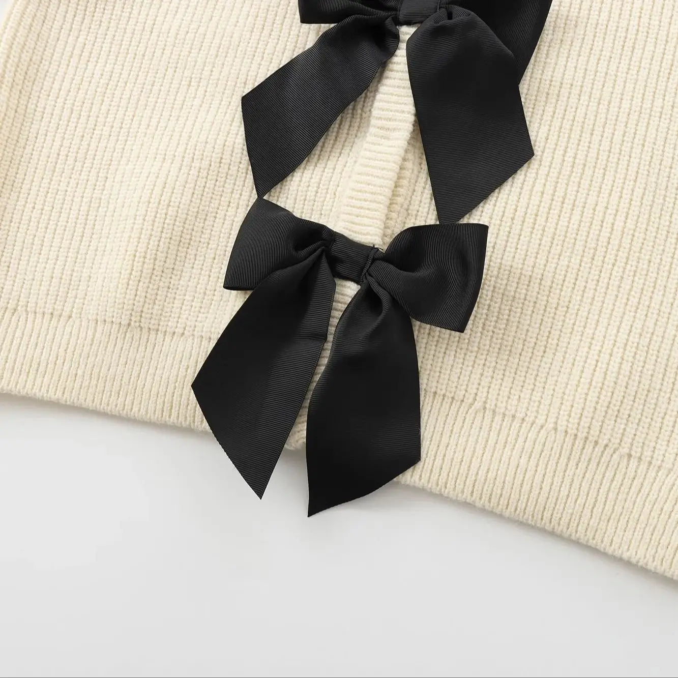 GIGI BOW CARDIGAN