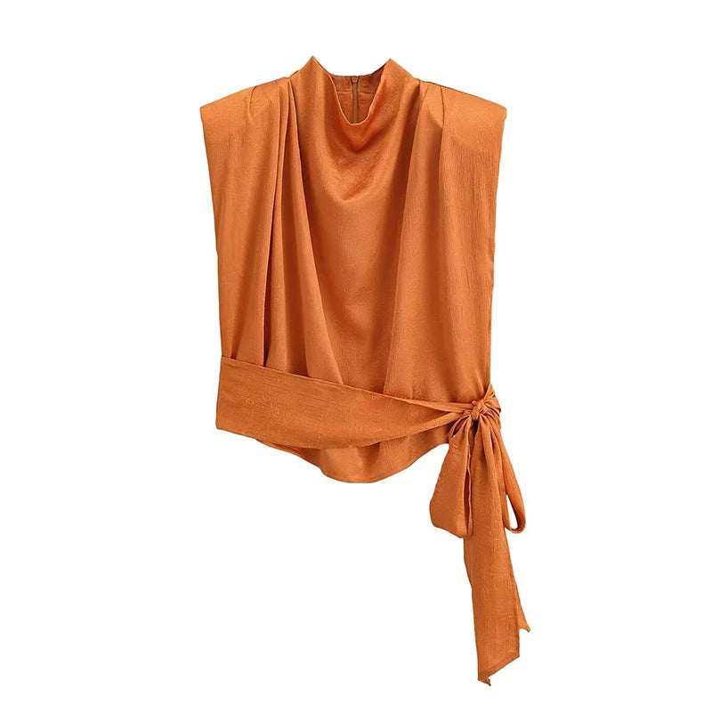 Orange sleeveless top with a tie detail on a white background